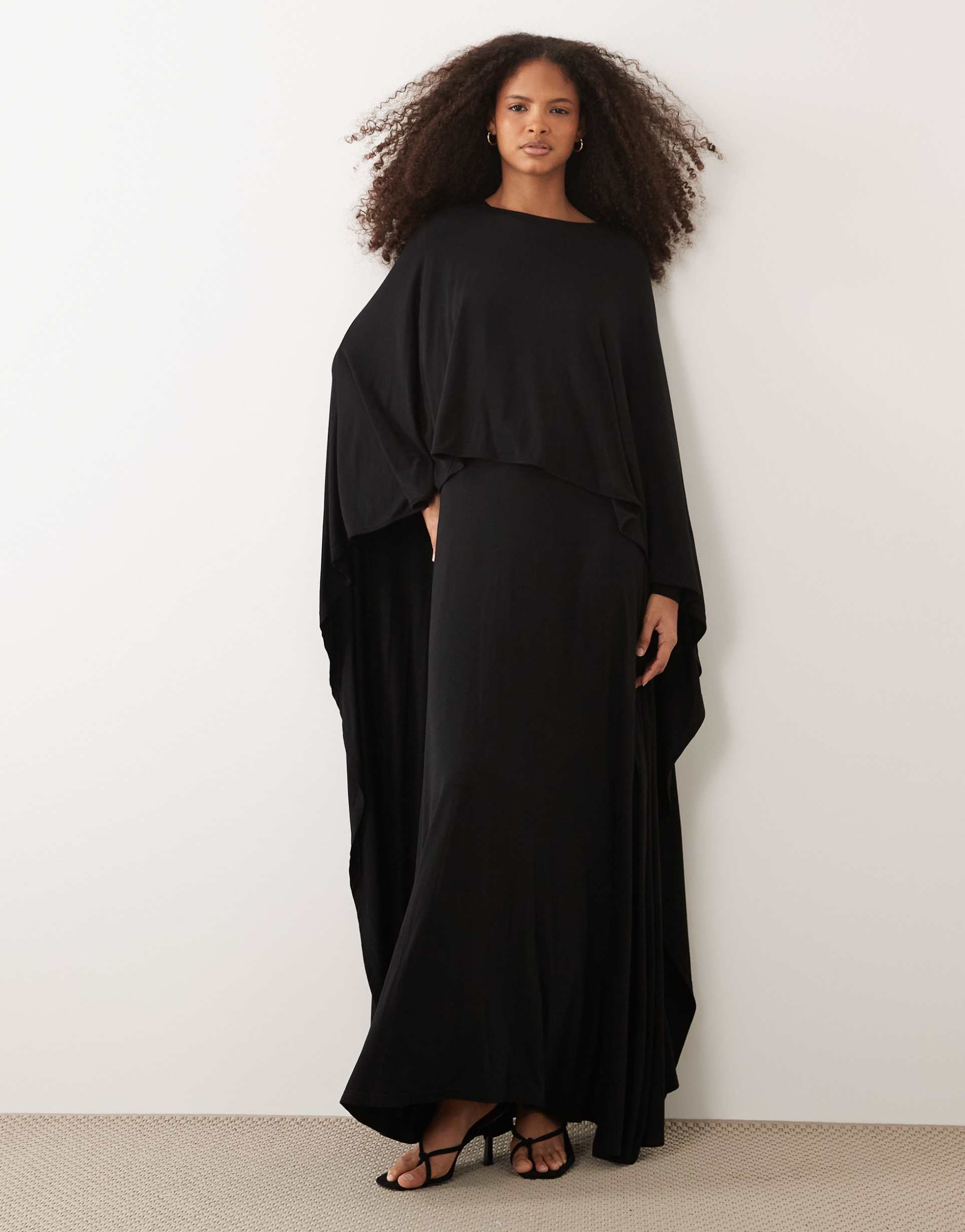 iyal jersey high low drape detail cape top in black