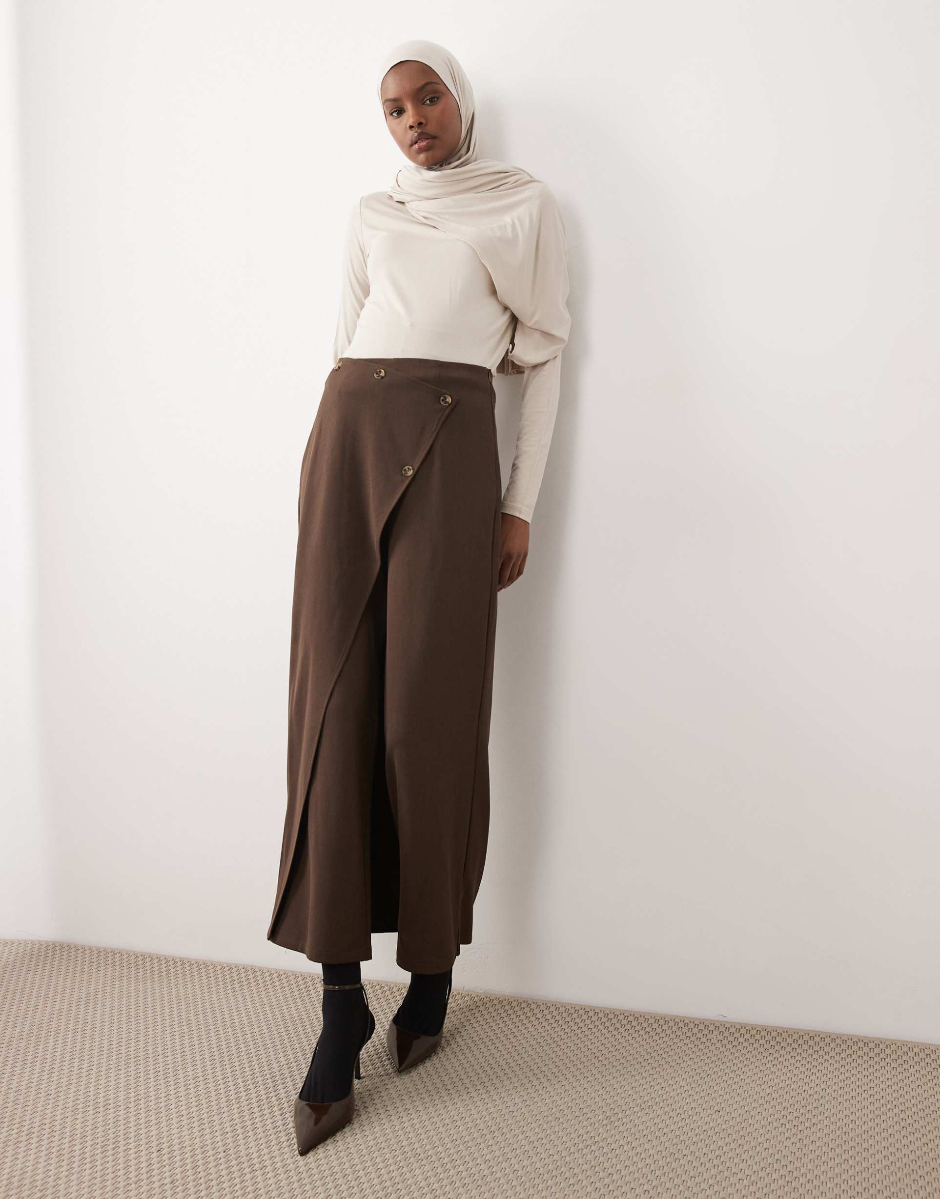 iyal pants with wrap over skirt button detail in brown