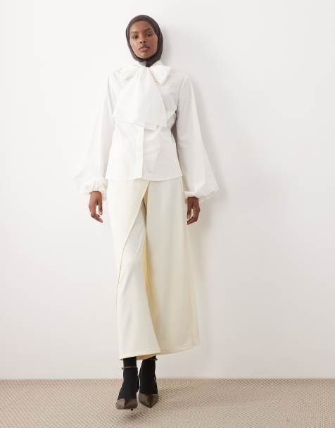 IYAL pants with wrap over skirt button detail in cream - view 1
