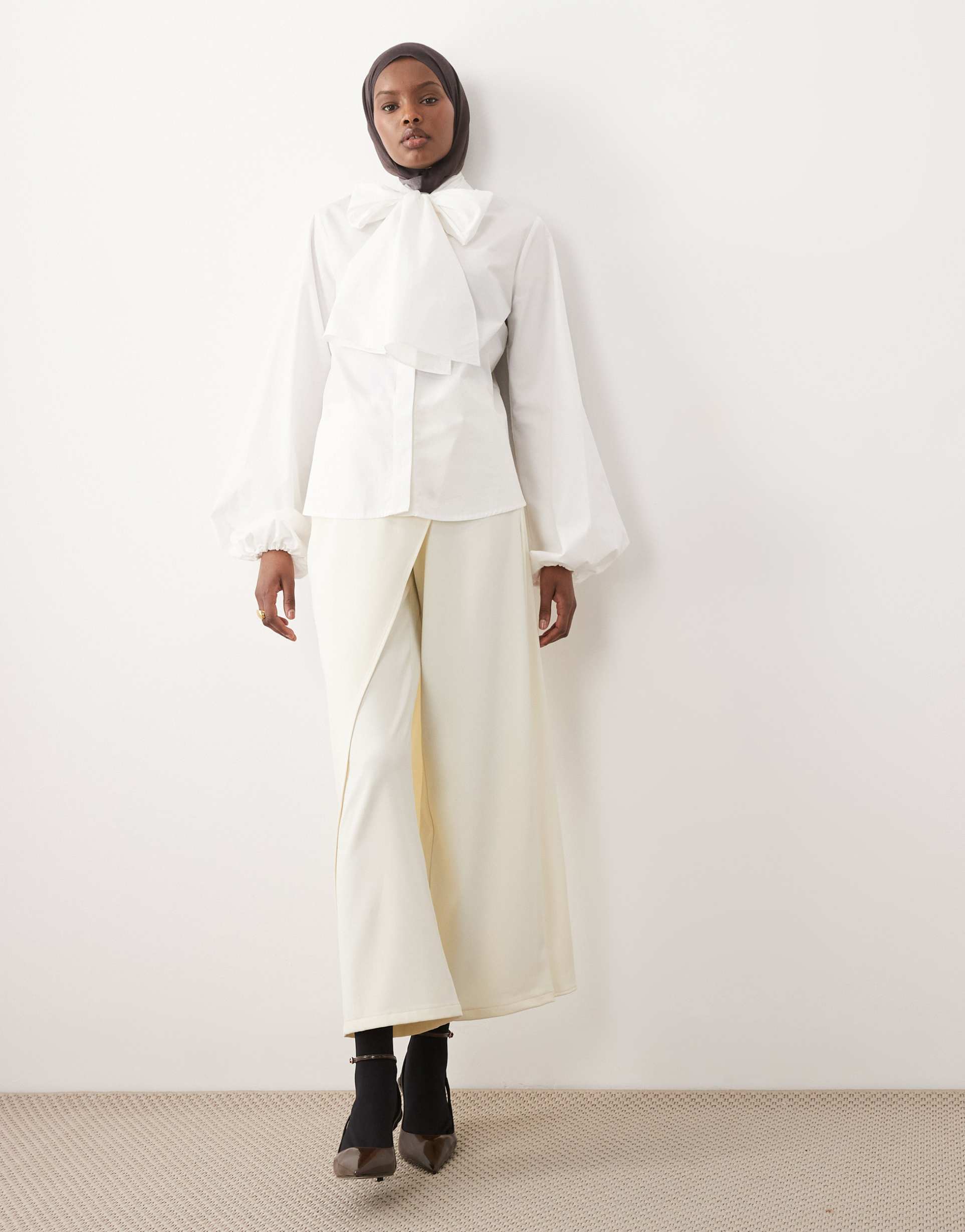 iyal pants with wrap over skirt button detail in cream