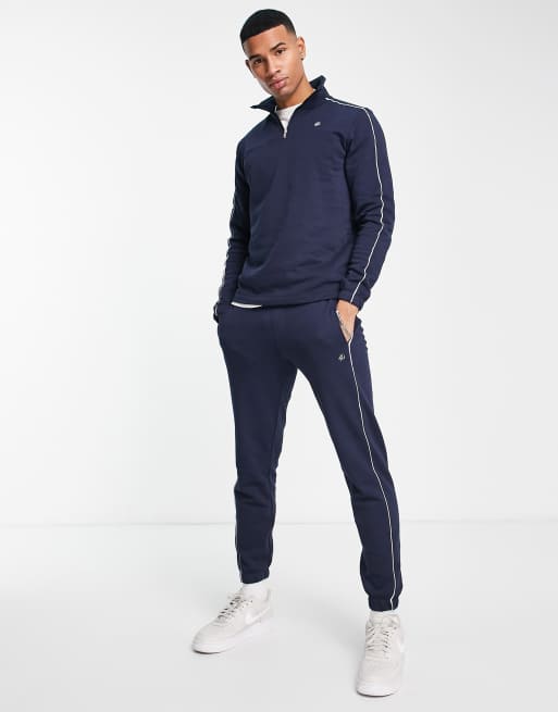 Jack & Jones 1/2 zip tracksuit set in navy | ASOS