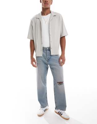 Alex baggy jeans with knee rip in stone washed blue