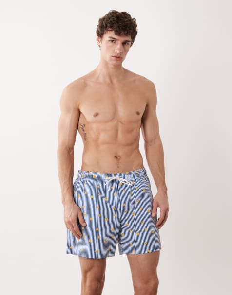 Jack & Jones – Badeshorts in Blau mit Streifen und Zitronenmuster - view 1