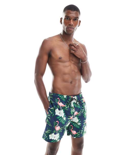 Jack & Jones – Badeshorts in Marineblau mit Flamingo-Print - view 1