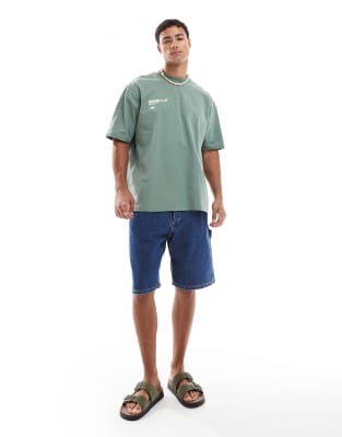 Jack & Jones baggy fit denim carpenter short in mid blue wash