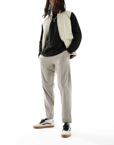 Jack & Jones – Bruna avsmalnande byxor i tech-material med slits vid nederkanten - view 1