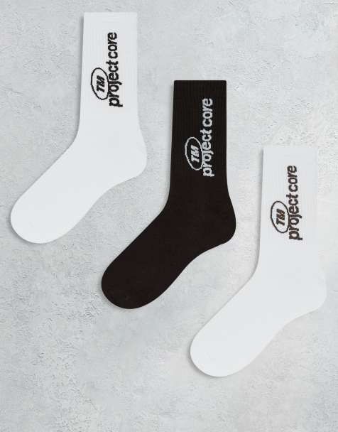 Jack & Jones – Bruna, vita och gräddvita träningsstrumpor med text på sidan, 3-pack - view 1