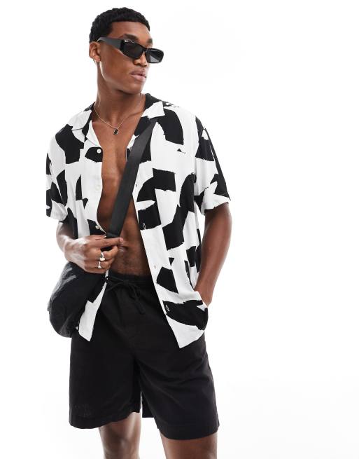 Jack & Jones - Camicia con colletto a rever con motivo geometrico a fiori neri 