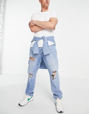 Jack & Jones Chris loose fit jean with knee rips in mid blue - ASOS Price Checker