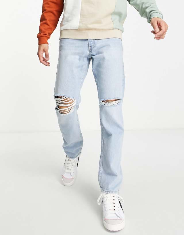 Jack & Jones - chris loose fit jeans with knee rips in light blue