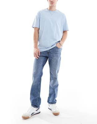 Clark - Straight Jeans in Mittelblau Blau W30 L34