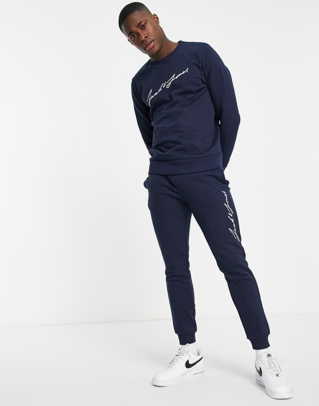 Jack & Jones crew neck script logo tracksuit in navy