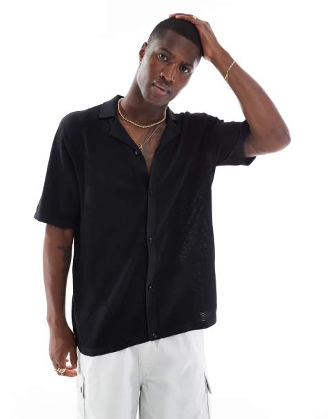 Jack & Jones oversized button through knitted polo in black 