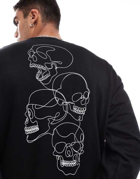 Jack & Jones drop shoulder crew neck sweat with skull back print in black - view 1