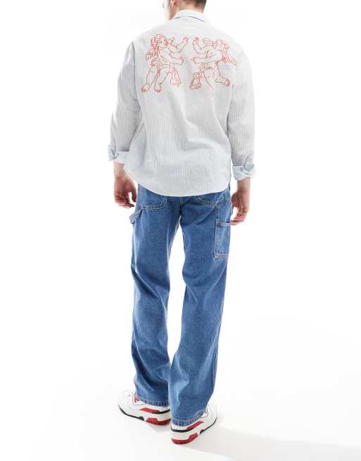 Jack & Jones - Eddie - Losse timmermansjeans in mid-wash blauw, 2 van 5