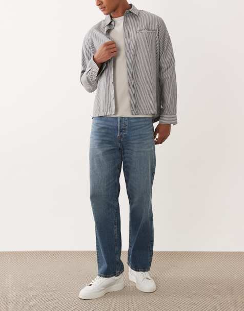 Jack & Jones Eddie loose fit jeans in mid blue