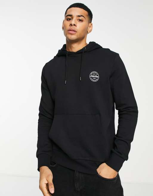 Jack & Jones Essentials hoodie with chest logo in black | ASOS