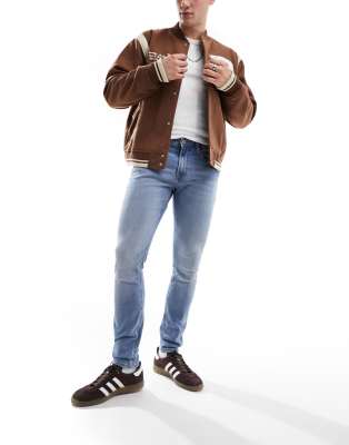 Jack & Jones Essentials Liam skinny fit jean in light wash blue  - ASOS Price Checker