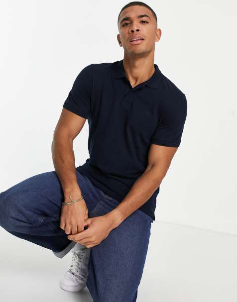 Jack & Jones Essentials slim fit pique logo polo in navy - view 1