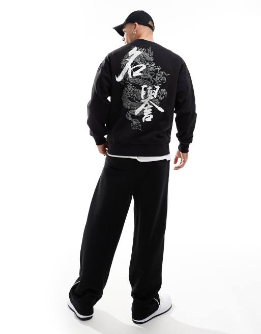 Jack & Jones - Felpa girocollo oversize nera con stampa con serpente sul retro 