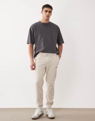 Gerade geschnittene Jogginghose in Beige mit Logo und Bündchen-Neutral Neutral XL