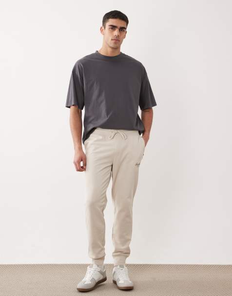 Jack & Jones – Gerade geschnittene Jogginghose in Beige mit Logo und Bündchen - view 1