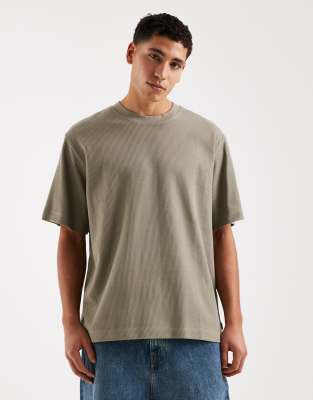 Geripptes Oversize-T-Shirt in Khaki-Grün Grün XS