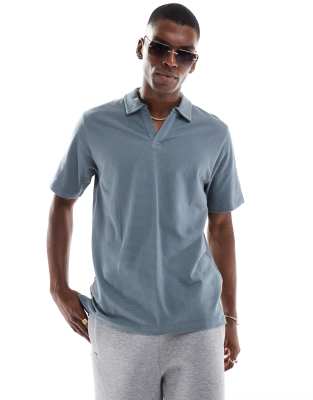 Geripptes Polohemd in Blau Blau M