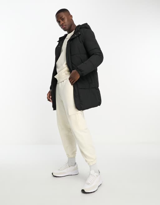 Jack & Jones - Gewatteerd jack met capuchon en lange pasvorm in zwart