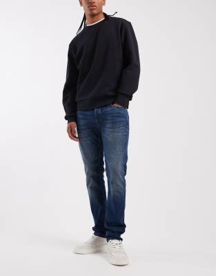 Glenn - Schmal geschnittene Jeans in Mittelblau Blau W33 L36