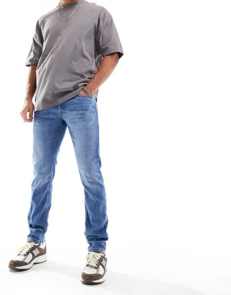 Jack & Jones Glenn slim tapered fit jeans in mid blue wash - view 1