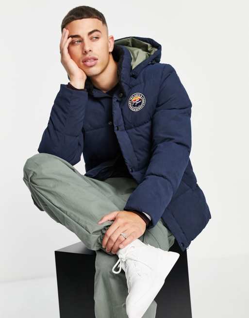 Jack & Jones – Granatowa kurtka ocieplana z kołnierzem ze sztucznego kożuszka i kapturem