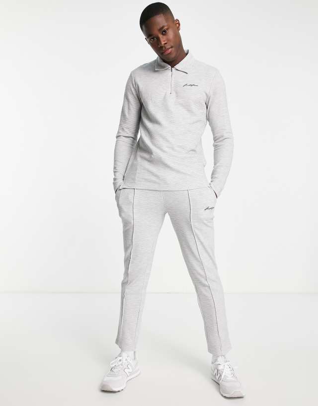 Jack & Jones half zip polo tracksuit with pleated sweatpants in gray