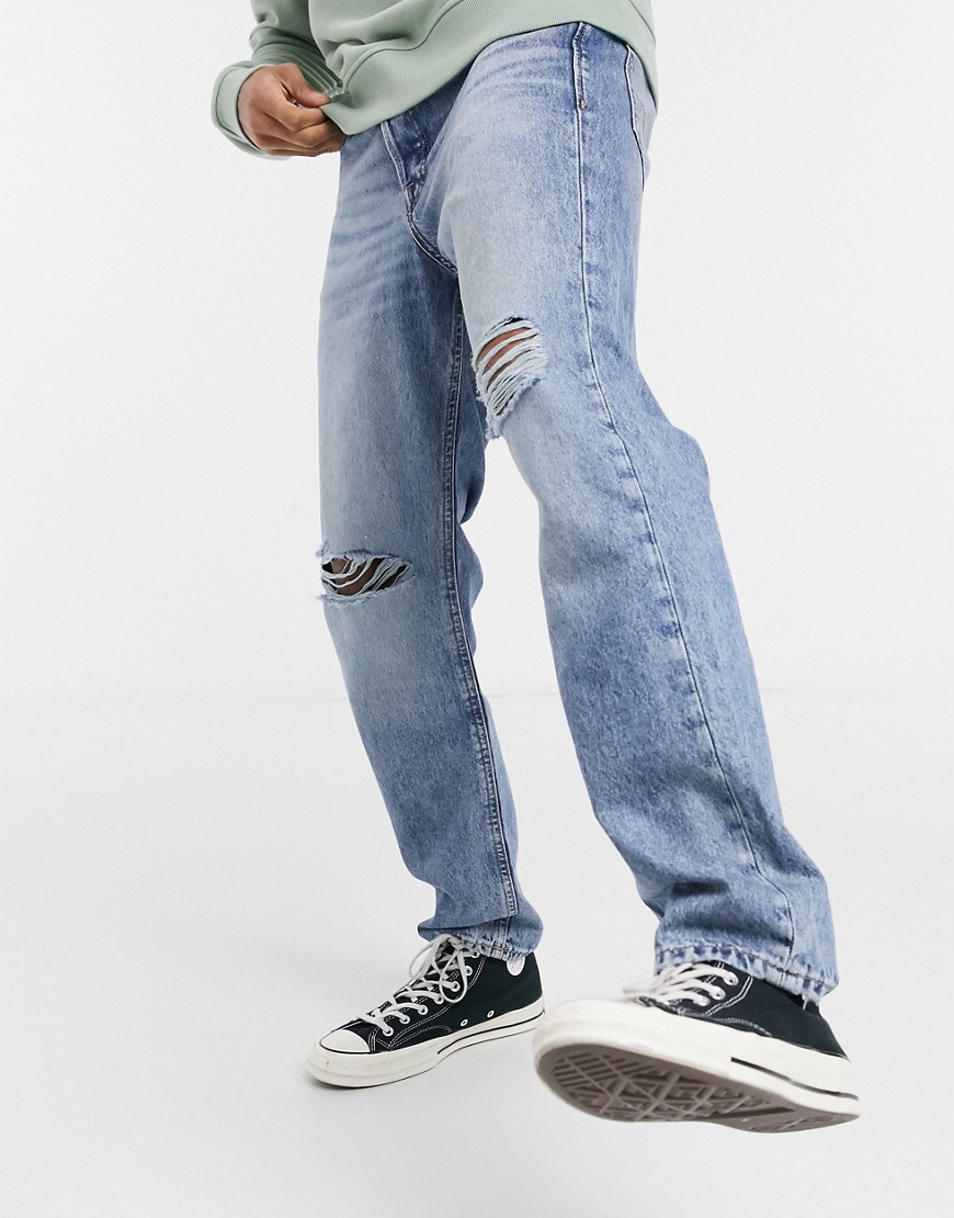 Jack & Jones Intelligence – Chris – Ljusblå jeans med lös passform och revor