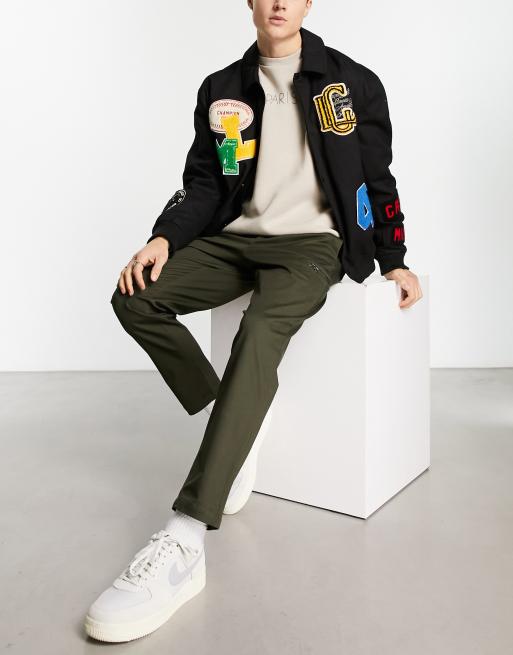 Jack & Jones Intelligence – Eleganckie zwężane bojówki o marchewkowym kroju w kolorze khaki z zapięciem na zamek