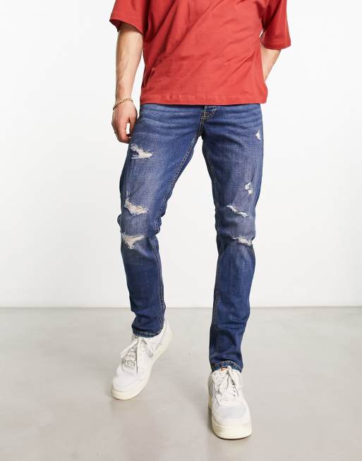 Jack & Jones Intelligence – Glenn – Schmal geschnittene Jeans in verwaschenem Mittelblau mit Abnutzungen 
