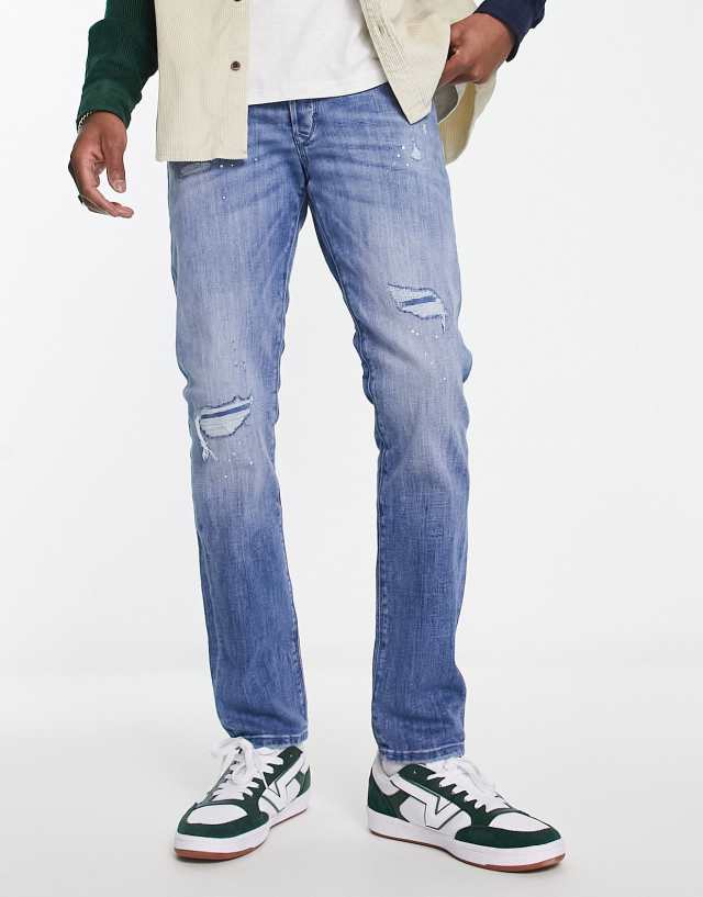 Jack & Jones - intelligence glenn slim fit jeans with pant platter rip and repair in light wash