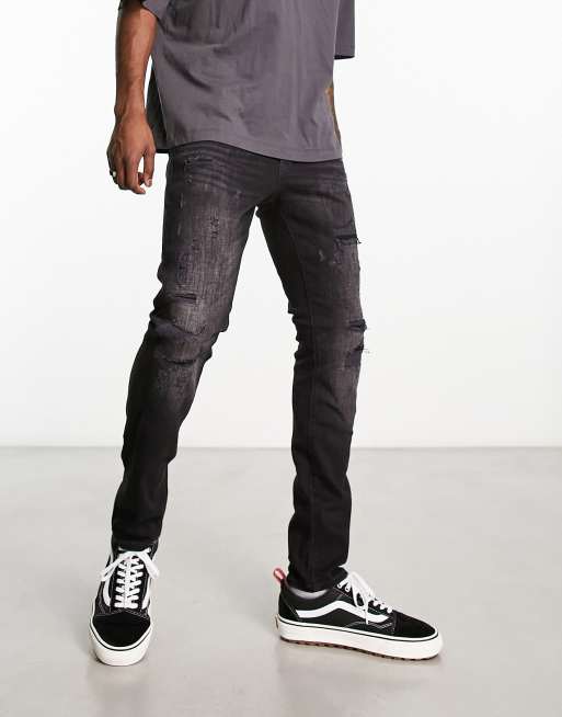 Jack & Jones Intelligence Glenn slim jeans with abrasions & paint splatter in washed black 