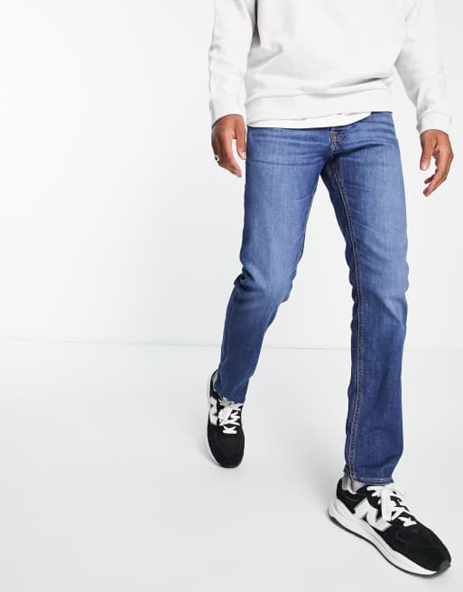 Jack Jones Intelligence Glenn slim tapered fit jeans in mid blue