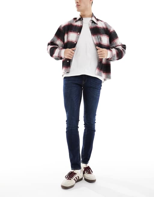 Jack & Jones Intelligence Liam – Ciemnoniebieskie jeansy o obcisłym kroju z efektem sprania , 2 z 5