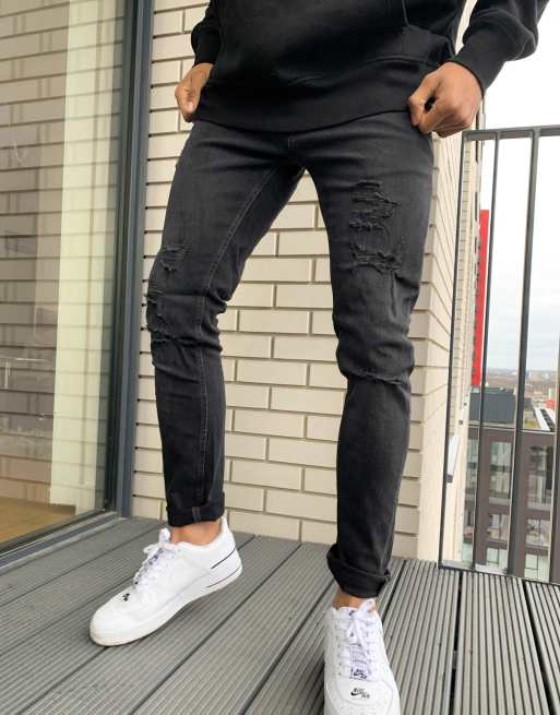 Jack Jones Intelligence Liam skinny fit jean with rips in black wash