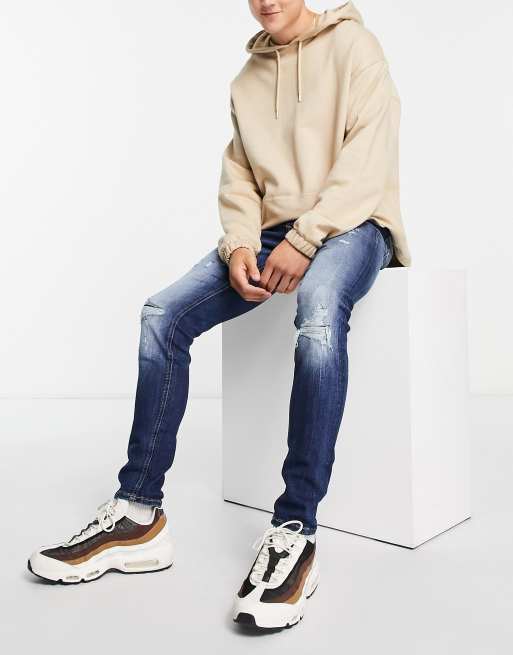 Jack & Jones Intelligence Liam skinny fit jean with rips in mid blue wash 