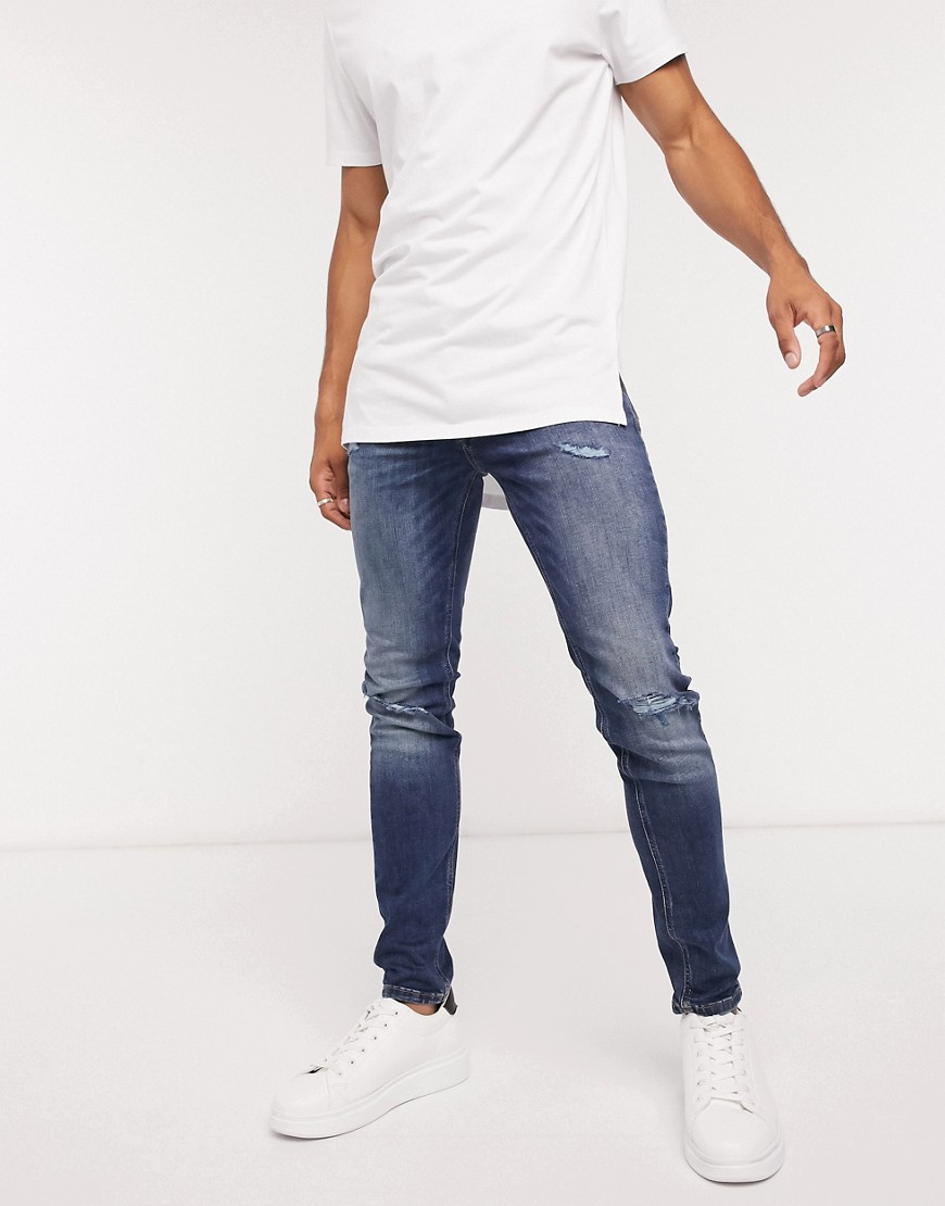Jack & Jones Intelligence - Liam - Skinny-fit jeans met scheuren in middenblauw