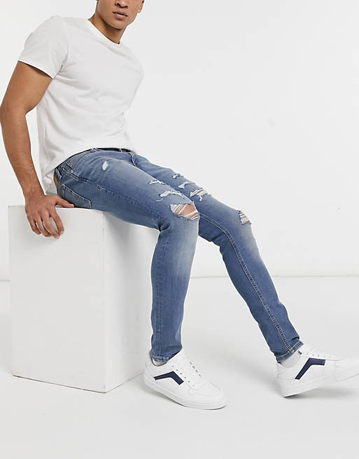 Jack & Jones Intelligence Liam skinny jeans with rips in blue
