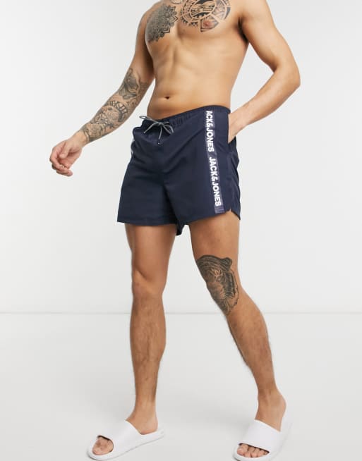 Jack & Jones Intelligence logo tape swim short in blue | ASOS