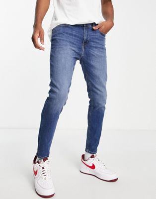 Jack & Jones Intelligence Pete carrot fit jeans in mid blue - ASOS Price Checker