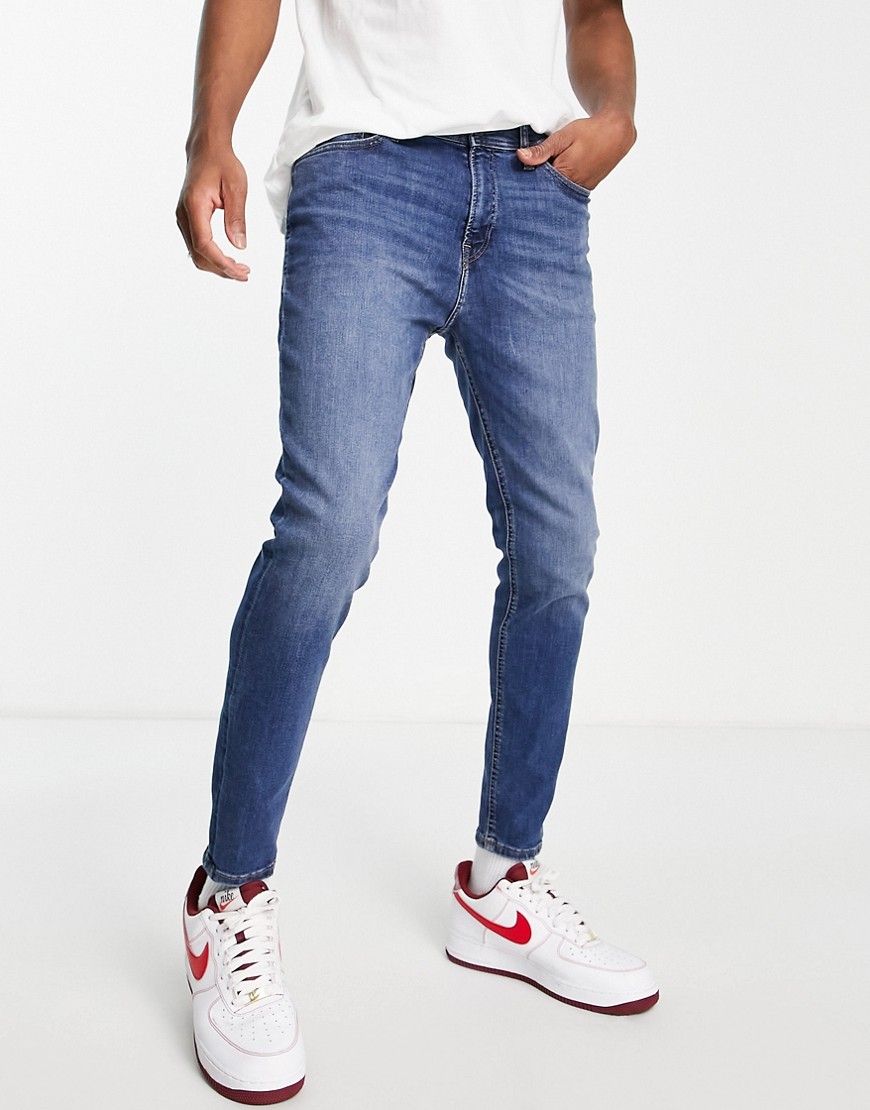 jack & jones intelligence - pete - mellanblå jeans med morotspassform