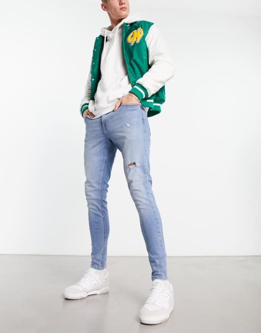 Jack & Jones Intelligence Pete skinny carrot fit jean with rips in blue wash 