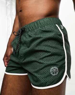 Jack & Jones Intelligence runner swim shorts in green print