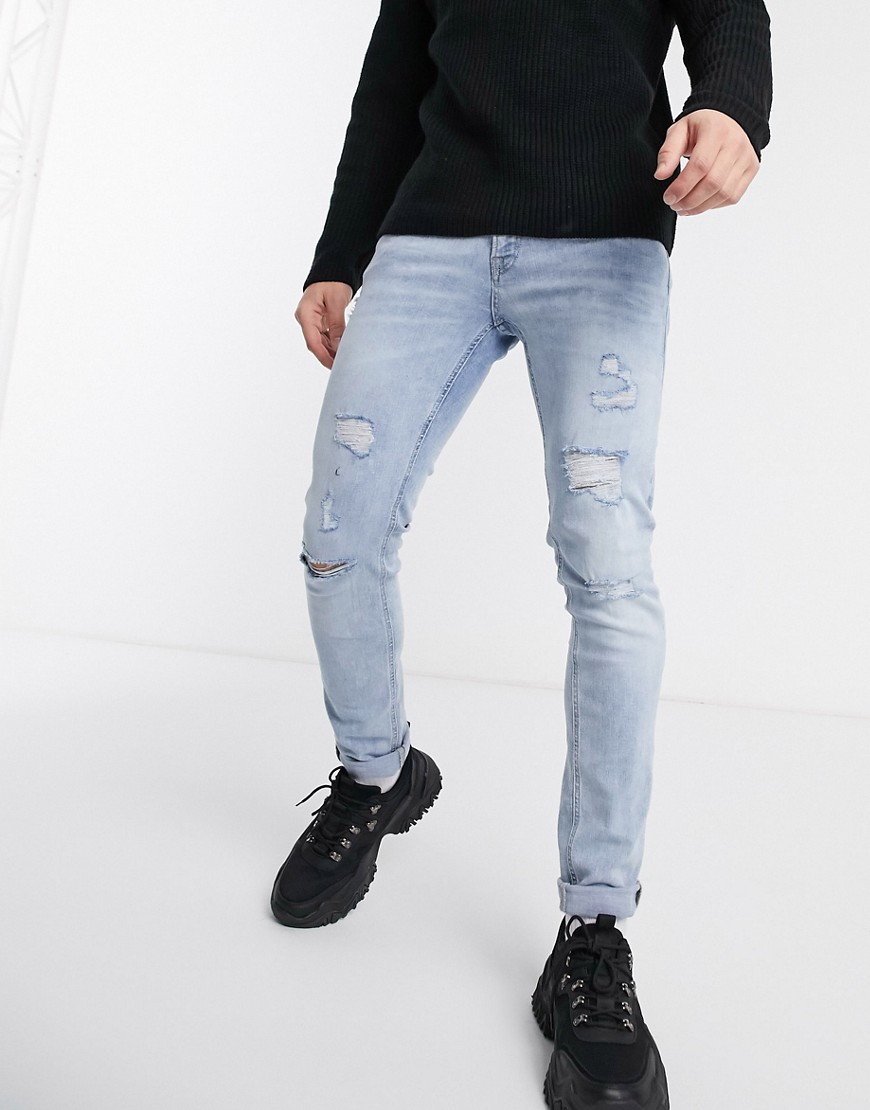 Jack & Jones Intelligence - Skinny-fit superstretch jeans met slijtplekken in lichte wassing-Blauw